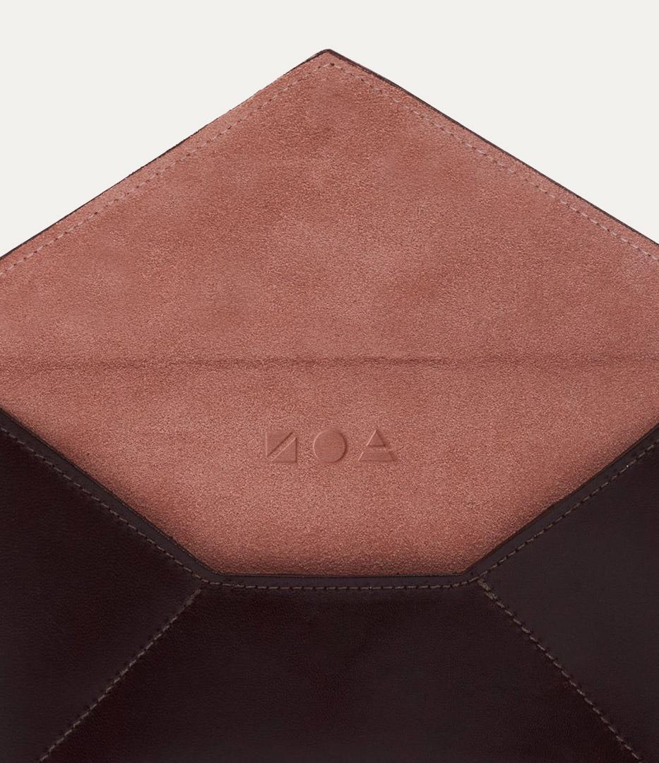 Zoa logo embossed on leather
